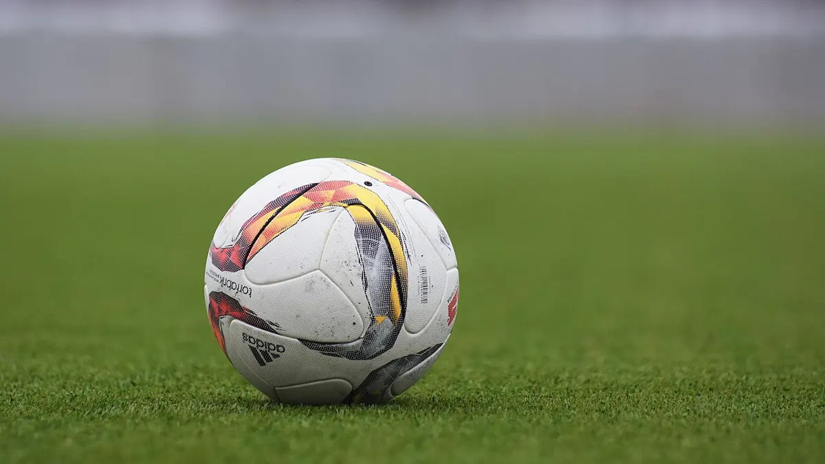 Football on a pitch - apuestas futuras liga mx